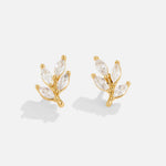 Zoé – Boucles d'oreilles dorées avec détail feuille
