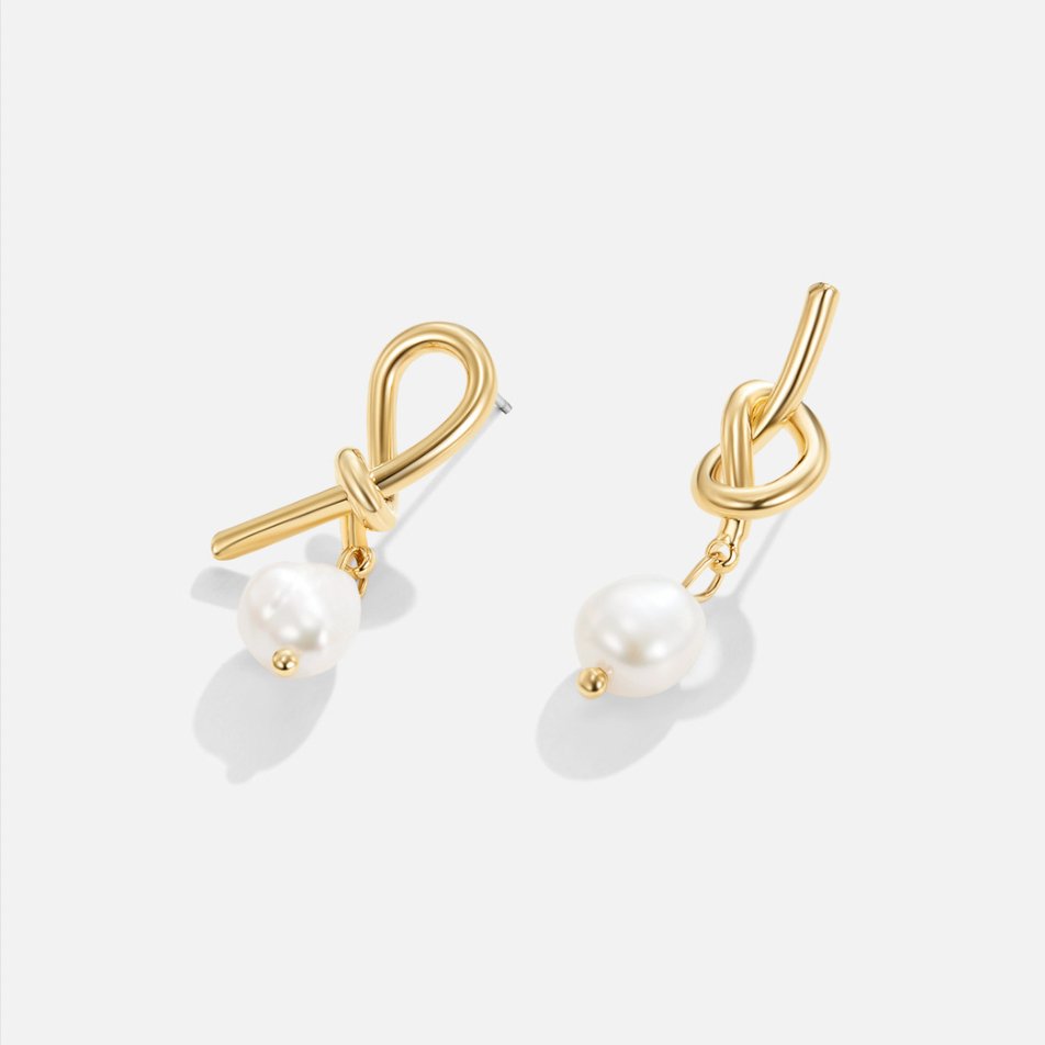Thérèse-Sophie – Boucles d'oreilles en argent à la forme courbe