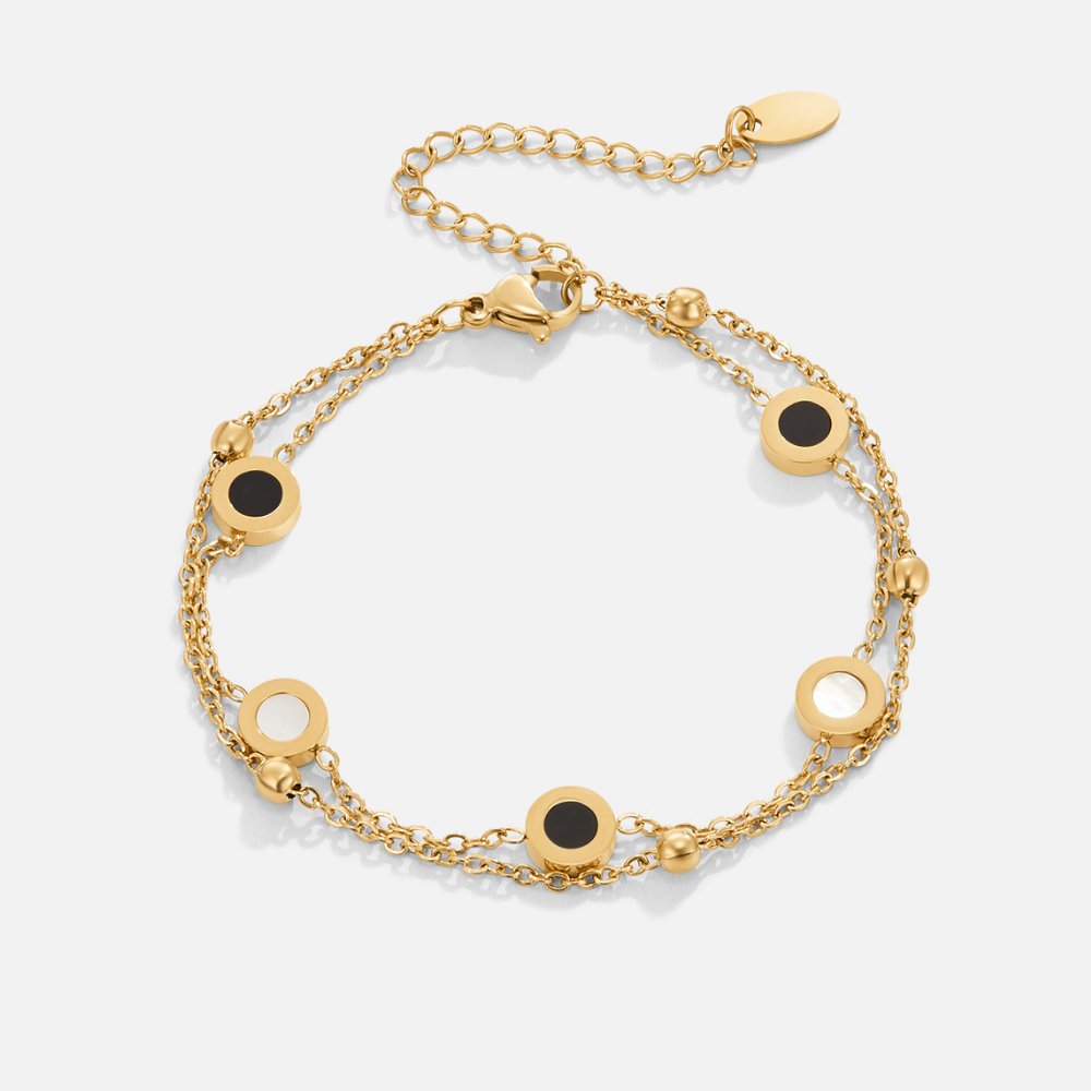Bracelet en onyx et pierre blanche